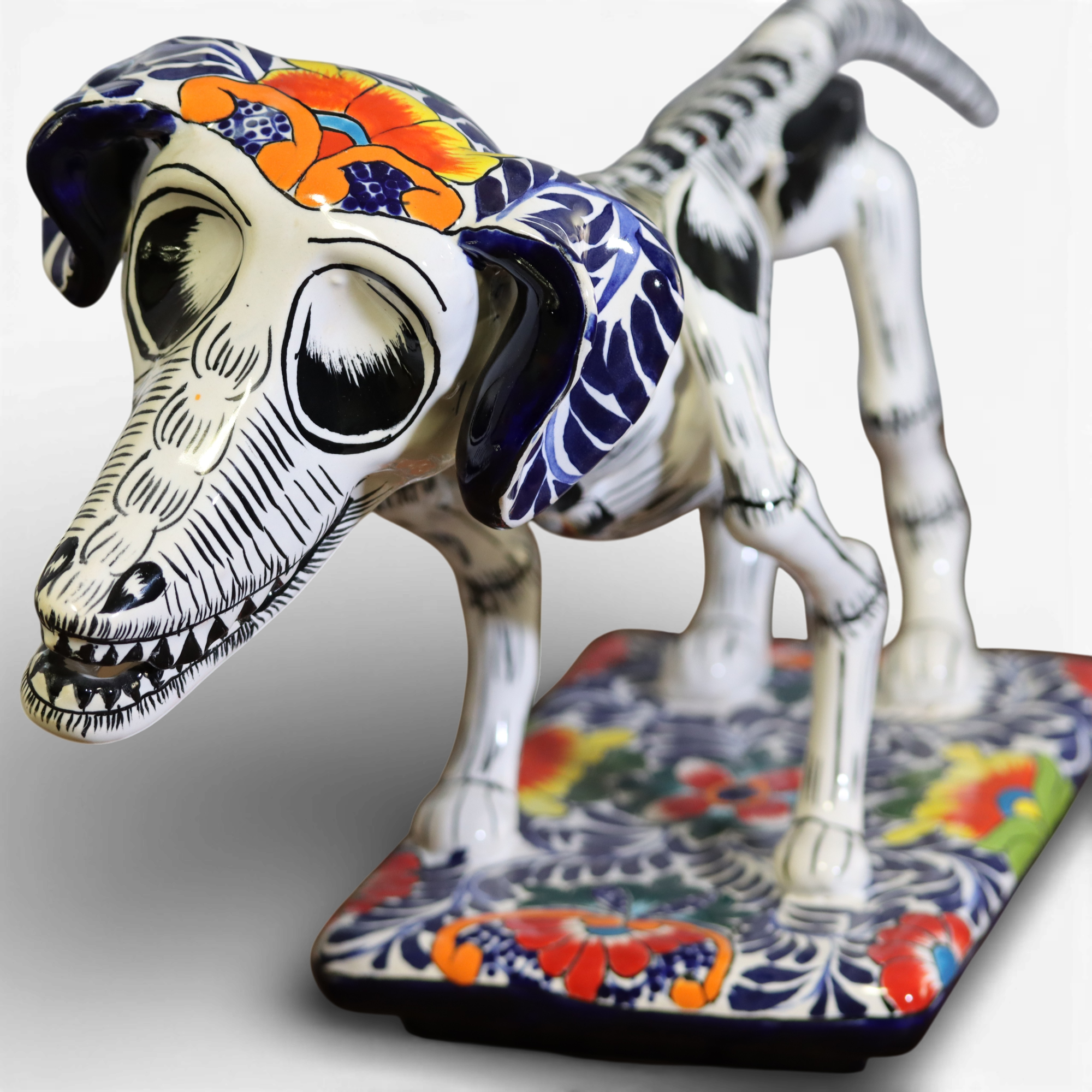 Talavera dachshund Día de los Muertos ceramic figurine close up hand painted detail Mexican decor