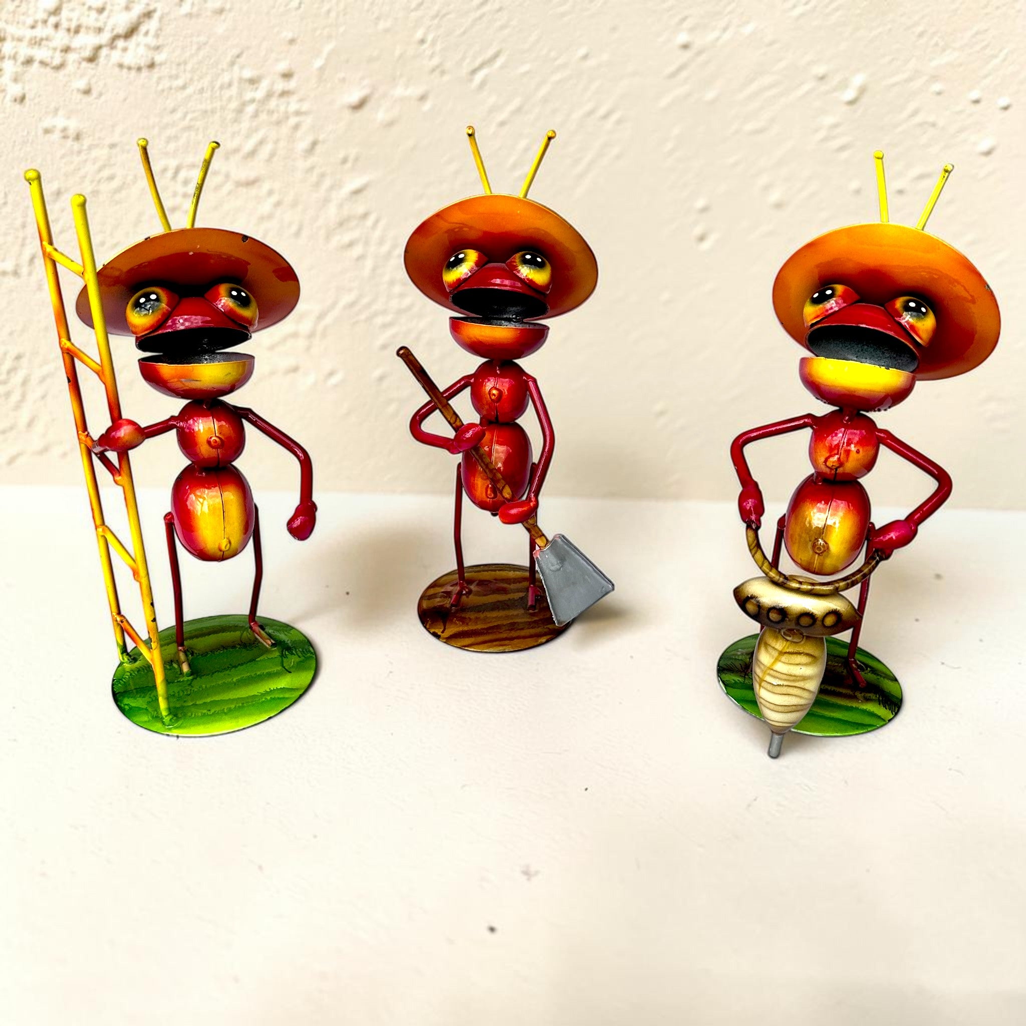 Set of three handmade metal ant garden sculptures with ladder, shovel, and drill — Mexican folk art outdoor decor