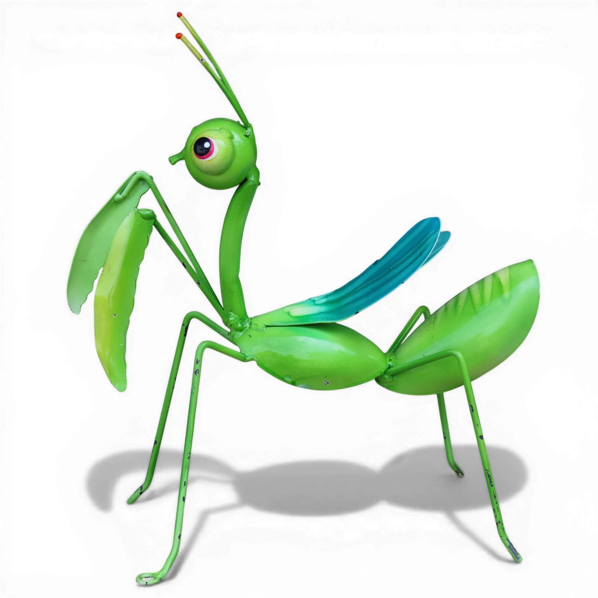 Full body view of metal praying mantis garden sculpture on white background showing teal wings and wire antennae detail